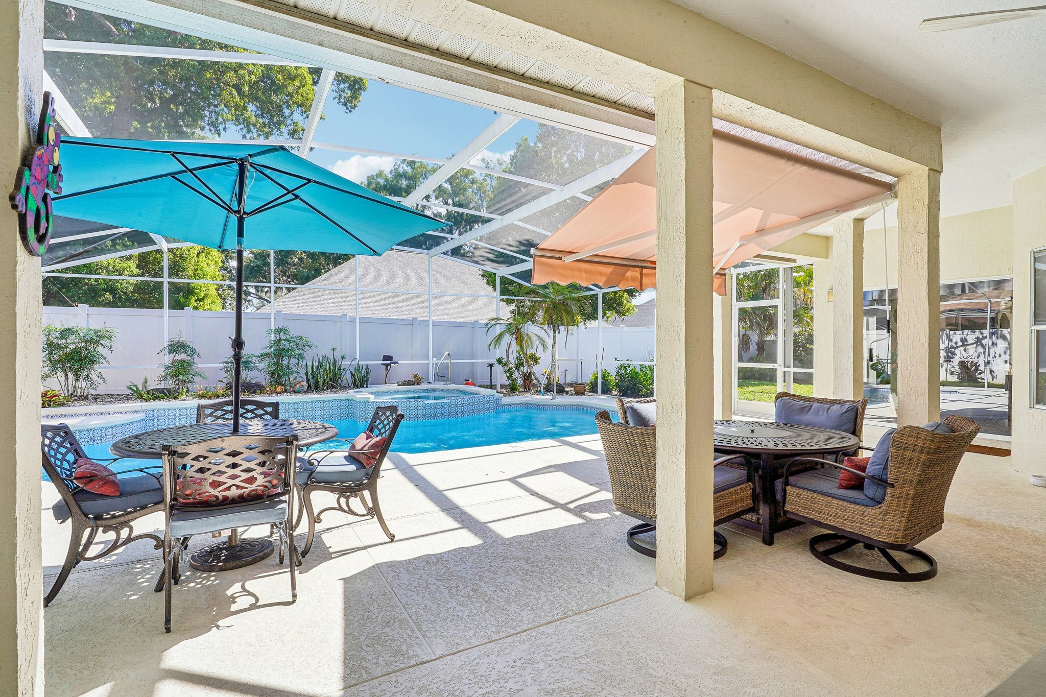 Outdoor dining, umbrella, and pool
